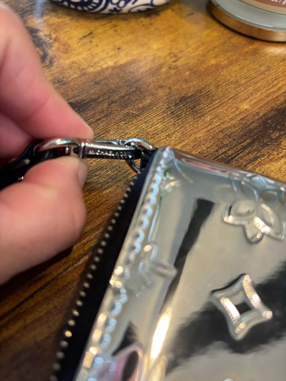 Michael Kors Silver Metallic Embossed Wristlet Wallet